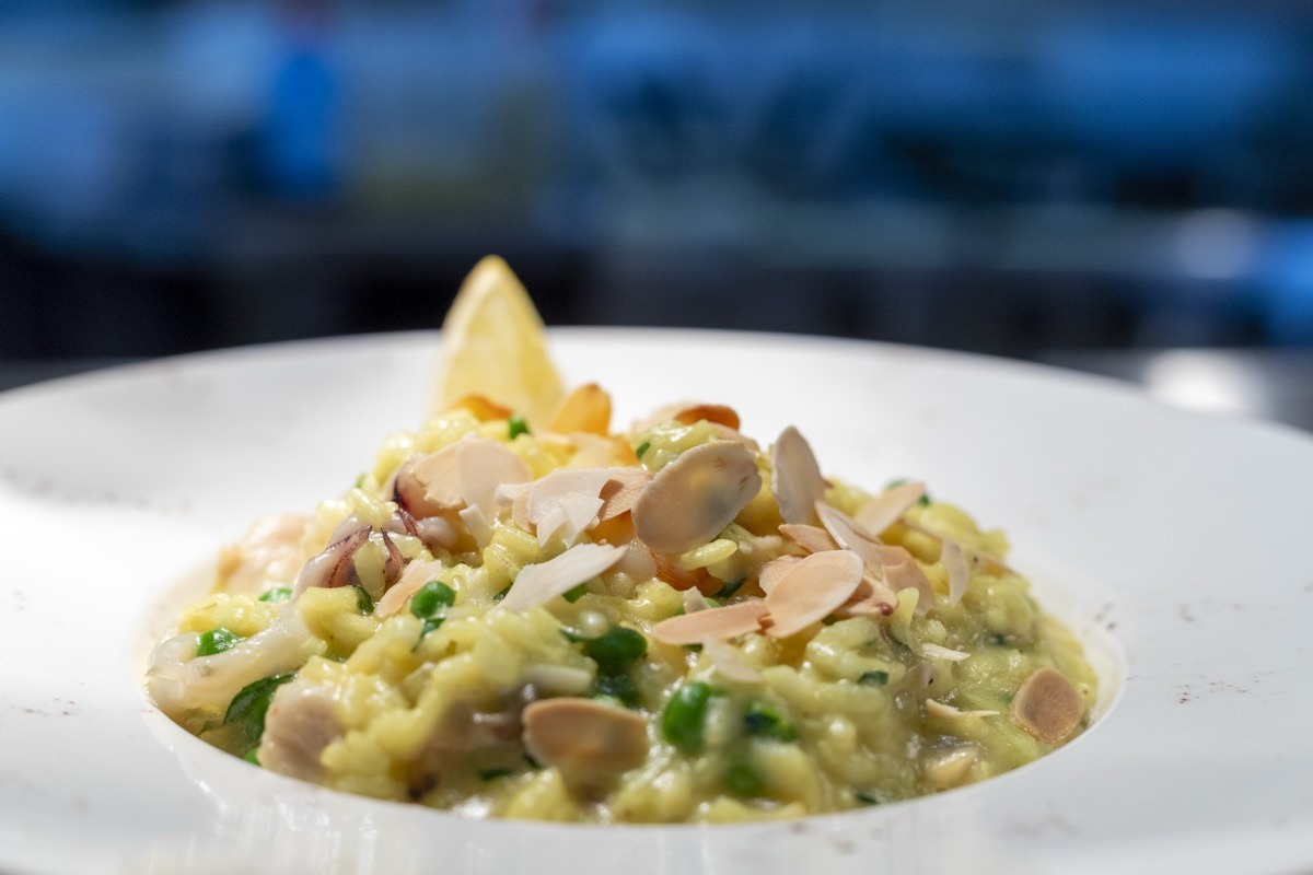 Creamy Italian risotto with peas and shaved almonds at Bianco Italian Caloundra