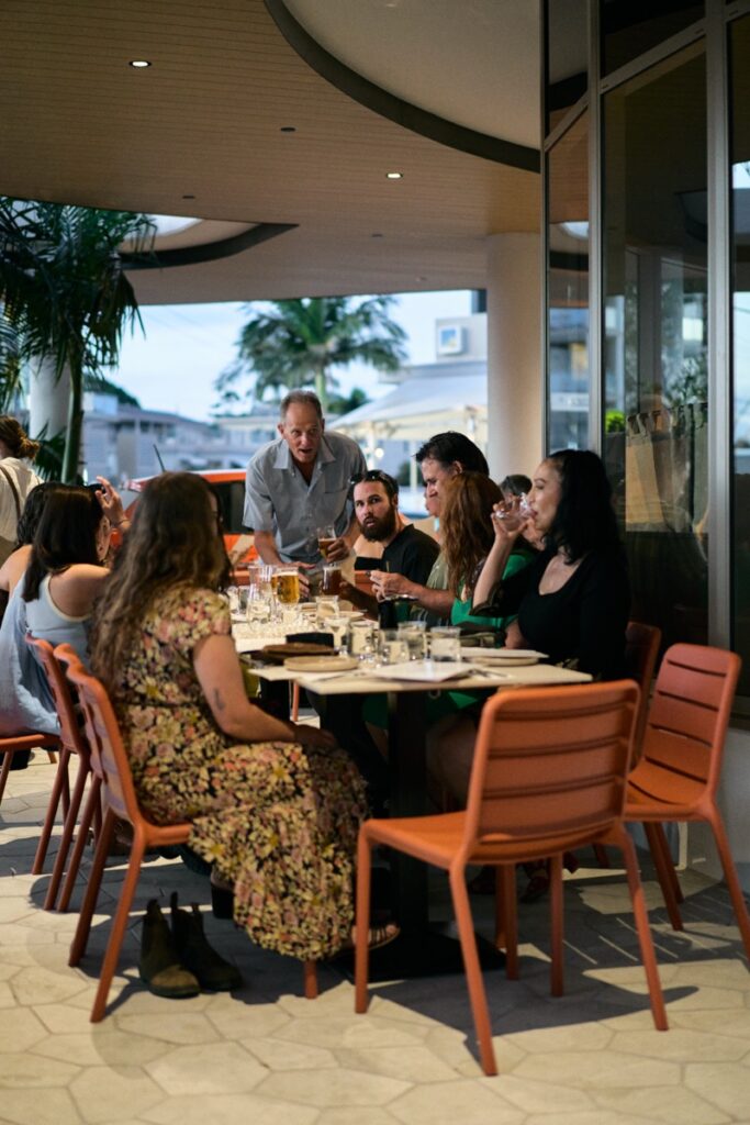 Group of guests dining together at Bianco Italian restaurant in Caloundra during opening night
