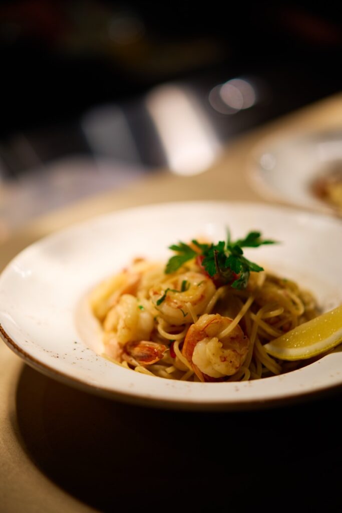 Prawn linguine pasta with lemon and fresh parsley served at Bianco Italian restaurant in Caloundra